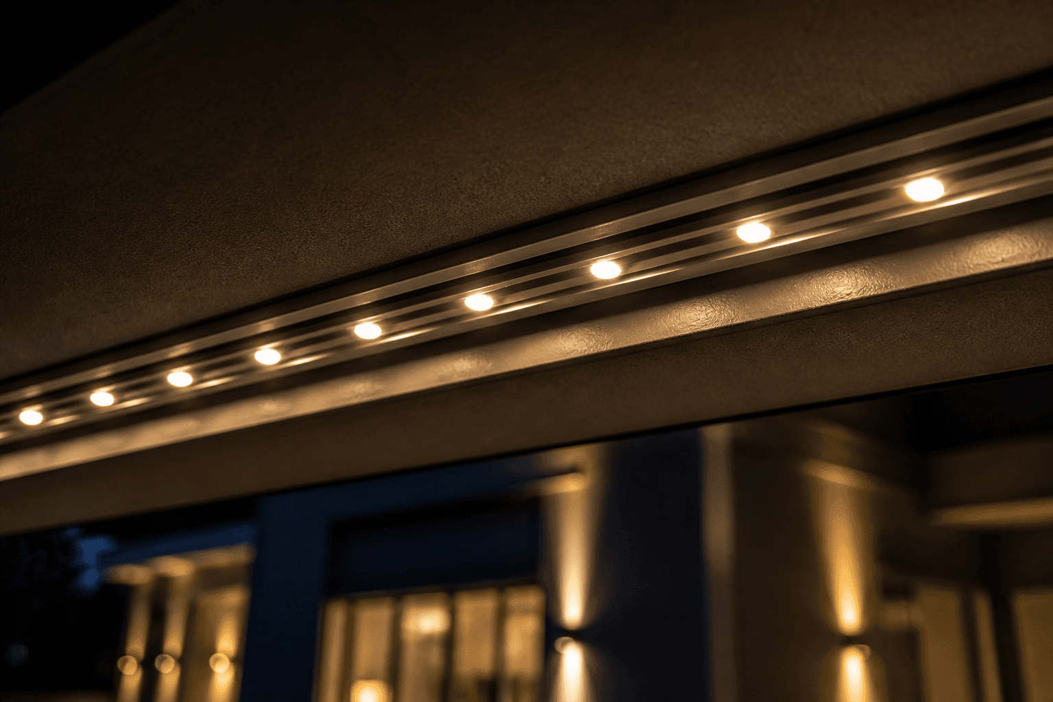 Close-up of glowing LED nodes in aluminum track